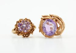 TWO 9 CARAT GOLD AMETHYST DRESS RINGS