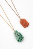 TWO CARVED JADE PENDANTS
