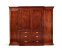 A VICTORIAN MAHOGANY COMPACTUM WARDROBE BY T & G SEDDON