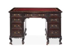 A LATE VICTORIAN CARVED MAHOGANY TWIN PEDESTAL DESK CIRCA 1890