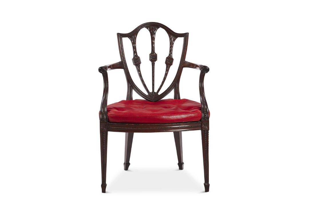 A GEORGE III MAHOGANY OPEN ARMCHAIR IN THE MANNER OF JOHN LINNELL