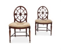 A PAIR OF GEORGE III MAHOGANY HALL CHAIRS ATTRIBUTED TO INCE & MAYHEW