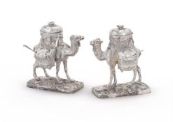 A PAIR OF ELECTRO-PLATED CAMEL CRUETS