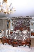 A CARVED MAHOGANY AND PARCEL GILT BED IN VICTORIAN TASTE, SECOND HALF 20TH CENTURY