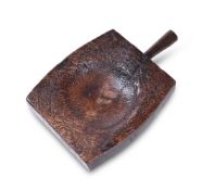 A CARVED OAK CHOPPING BOARD/BLOCK, LATE 18TH/EARLY 19TH CENTURY
