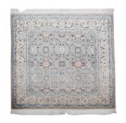 A TABRIZ PART SILK RUG