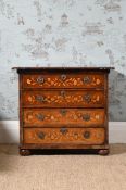 A DUTCH WALNUT AND MARQUETRY COMMODE, EARLY 18TH CENTURY AND LATER