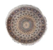 A TABRIZ PART SILK CIRCULAR RUG