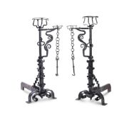 A LARGE PAIR OF WROUGHT IRON FIRE DOGS IN THE 17TH CENTURY STYLE, 19TH CENTURY
