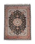 A TABRIZ PART SILK RUG