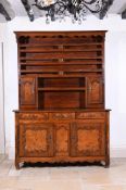 A FRENCH CHESTNUT AND POLLARD OAK DRESSER, EARLY 19TH CENTURY