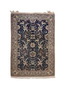 A TABRIZ PART SILK RUG