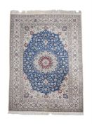 A TABRIZ PART SILK RUG