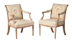 A PAIR OF FRENCH BEECH FRAMED FAUTEUILSOF LOUIS XVI DESIGN