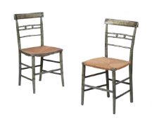 A PAIR OF PAINTED AND PARCEL GILT SIDE CHAIRS
