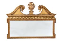 A GILTWOOD WALL MIRROR IN GEORGE III STYLE