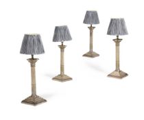 A SET OF FOUR SILVER PLATED CORINTHIAN COLUMN TABLE LAMPS, EARLY 20TH CENTURY