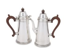 A PAIR OF SILVER TAPERING CAFE AU LAIT POTS