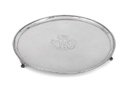 A GEORGE III SILVER CIRCULAR SALVER
