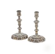 A PAIR OF IRISH SILVER GILT CANDLESTICKS