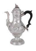 A GEORGE III SILVER OGEE BALUSTER COFFEE POT