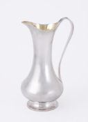 A SILVER BRITANNIA STANDARD BALUSTER ARTIST JUG
