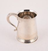 A SILVER BALUSTER MUG
