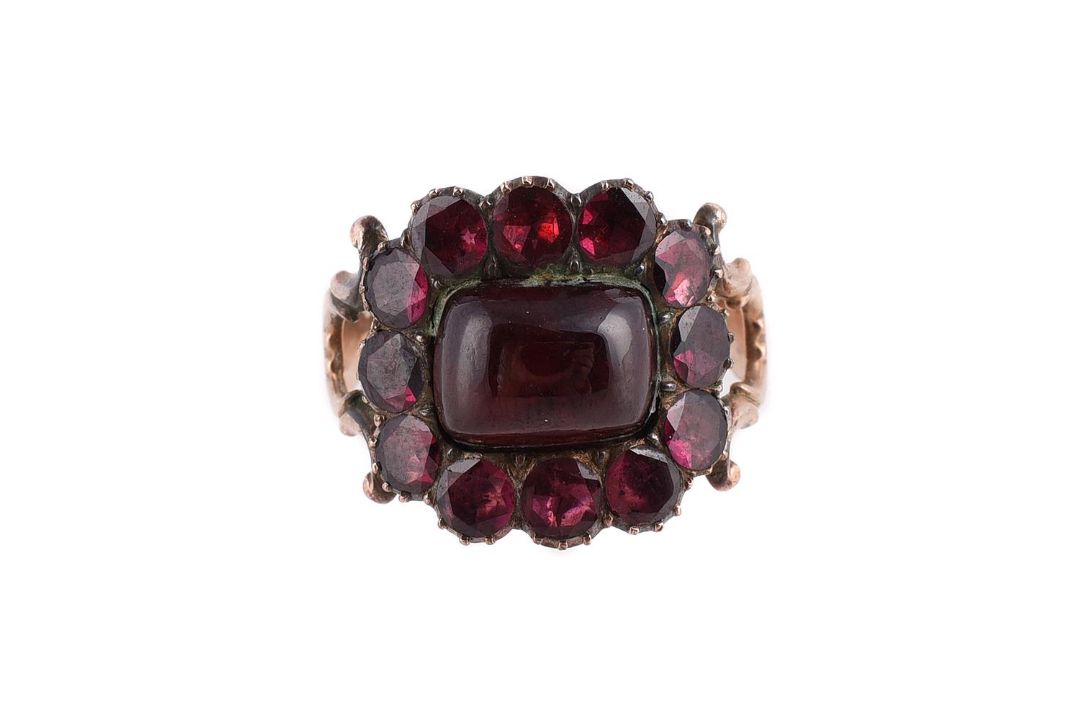 A GEORGIAN AND LATER GARNET CLUSTER RING - Image 1 of 2