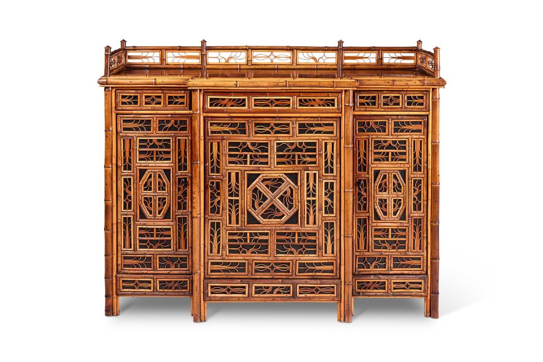 A BAMBOO, RATTAN, WALNUT AND PART EBONISED 'CHINOISERIE' BREAKFRONT SIDE CABINET - Image 1 of 5