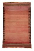 A KILIM RUG WITH PINK GROUND
