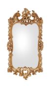 A CONTINENTAL ROCCOCO GILTWOOD MIRROR, MID 18TH CENTURY