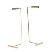 A PAIR OF BRASS STANDARD OR READING LAMPS