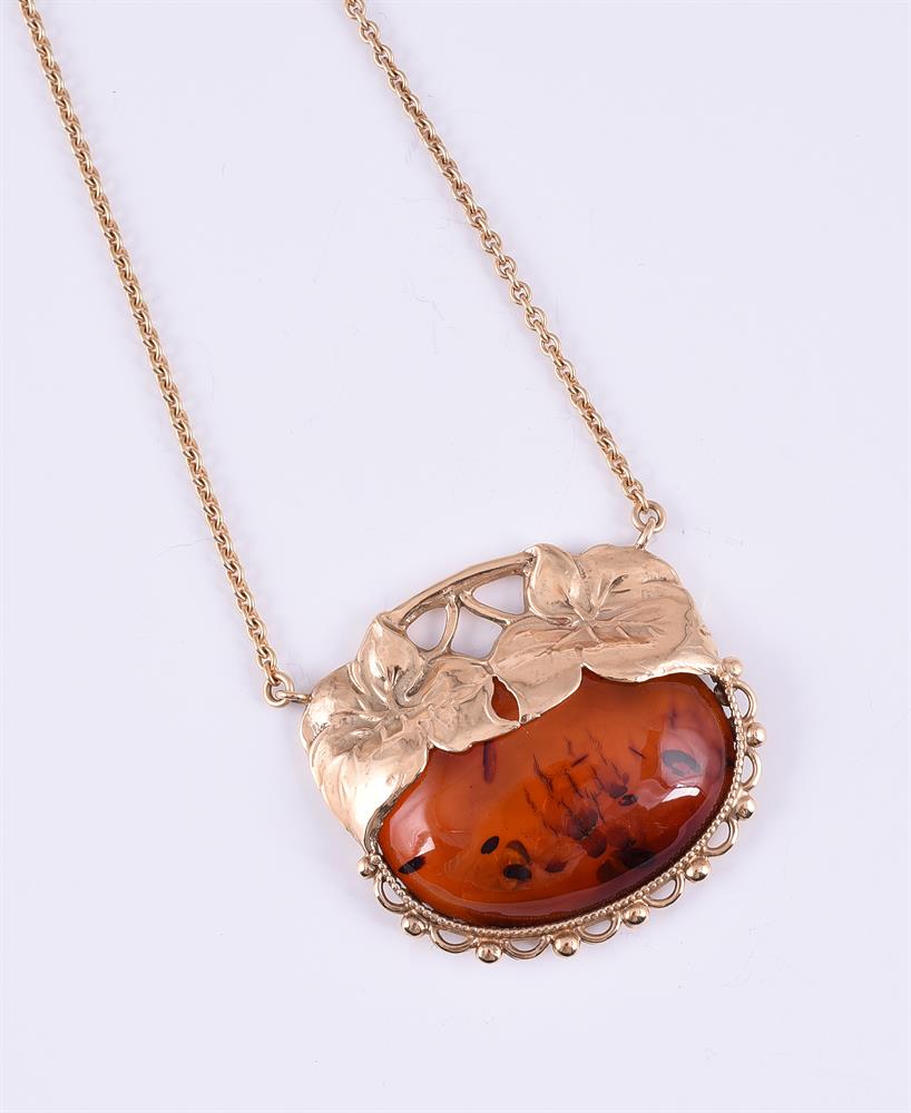 J. B. SORENSEN, A HEATED AMBER PENDANT
