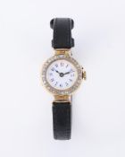 UNSIGNED, A LADY'S 18 CARAT GOLD AND DIAMOND WRIST WATCH