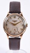 Y LONGINES, A 9 CARAT GOLD WRISTWATCH