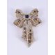 A SAPPHIRE AND DIAMOND PIERCED BOW BROOCH - Image 1 of 2
