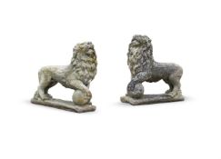 AFTER THE ANTIQUE A PAIR OF COMPOSITION STONE MEDICI LIONS, 20TH CENTURY