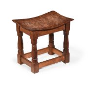 AN OAK AND POLLARD OAK STOOL, IN THE MANNER OF ROBERT 'MOUSEMAN' THOMPSON