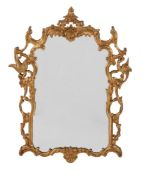A GILTWOOD WALL MIRROR IN GEORGE III STYLE