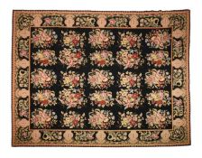 AN ENGLISH NEEDLEPOINT RUG