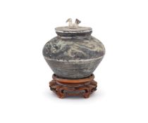 A Chinese painted pottery vase and cover