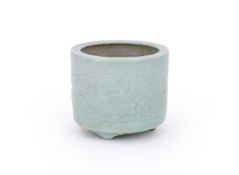 A Chinese celadon glazed 'peony' censer