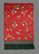 An attractive Chinese silk mirror cover