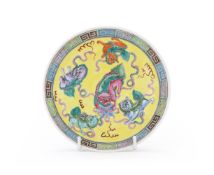 A Chinese Famille rose 'lion' saucer dish