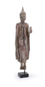A carved and painted wood figure of Buddha