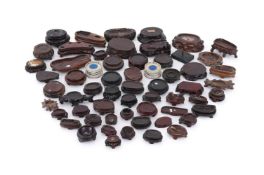 † A group of sixty miniature Chinese wood stands