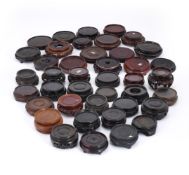 † A group of forty Chinese circular wood stands