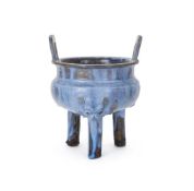 A large Chinese flambé glazed tripod censer