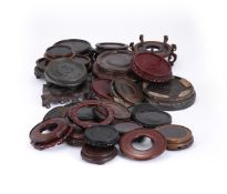 † A group of twenty-six Chinese circular stands