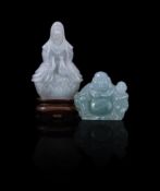 A pale grey jadeite figure of Guanyin